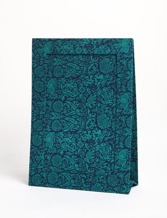 A4 size fabric photo frame with fold-out stand, made using upcycled clothing and recycled fashion concepts. Ideal for showcasing pictures, this eco friendly cloth-inspired frame highlights conscious clothing, zero waste clothing, and the essence of slow fashion.