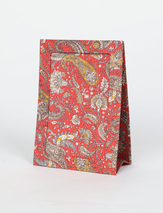 A5 rectangular fabric-covered tabletop photo frame with fold-out stand, created using upcycled clothing and repurposed clothing techniques. An eco friendly product inspired by zero waste clothing, fair trade fashion, and environmentally friendly clothing ideals, perfect for displaying photos or posters.