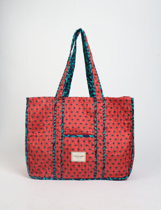 Quilted work tote bag with structured rectangular design and long shoulder straps, representing slow fashion and ethical clothing ideals, made as part of upcycled women's clothing and sustainable women's clothing using recycled fashion and earth friendly clothing practices.