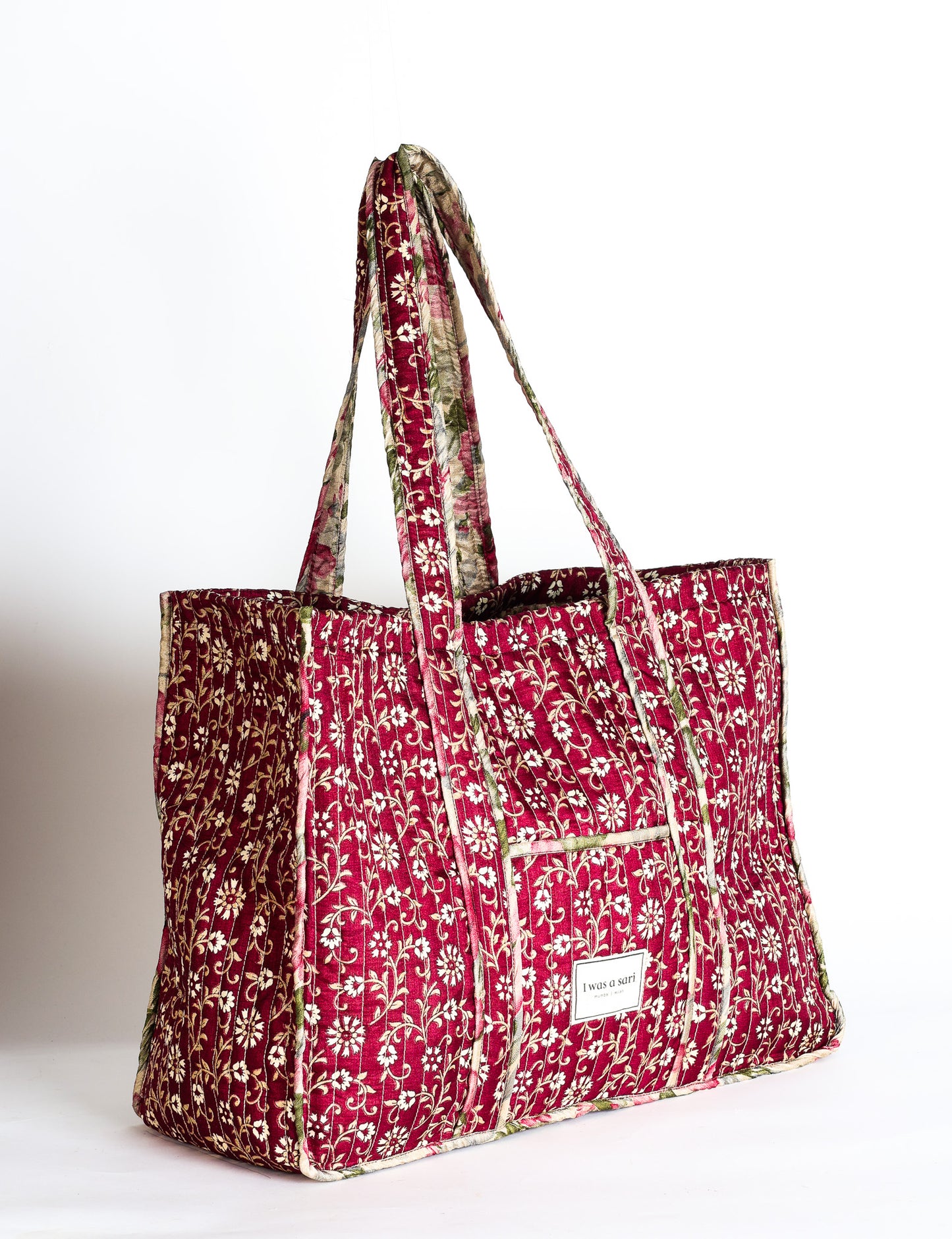 Quilted work tote bag with structured rectangular design and long shoulder straps, representing slow fashion and ethical clothing ideals, made as part of upcycled women's clothing and sustainable women's clothing using recycled fashion and earth friendly clothing practices.