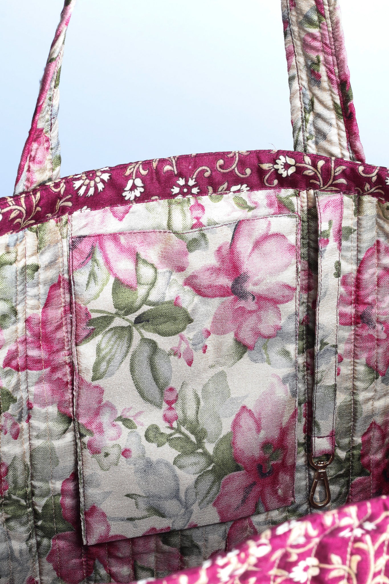 Quilted work tote bag with structured rectangular design and long shoulder straps, representing slow fashion and ethical clothing ideals, made as part of upcycled women's clothing and sustainable women's clothing using recycled fashion and earth friendly clothing practices.
