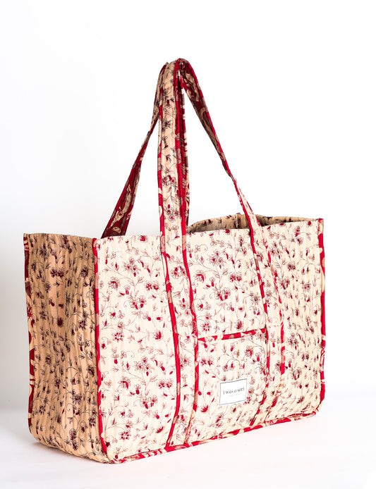 Quilted work tote bag with structured rectangular design and long shoulder straps, representing slow fashion and ethical clothing ideals, made as part of upcycled women's clothing and sustainable women's clothing using recycled fashion and earth friendly clothing practices.