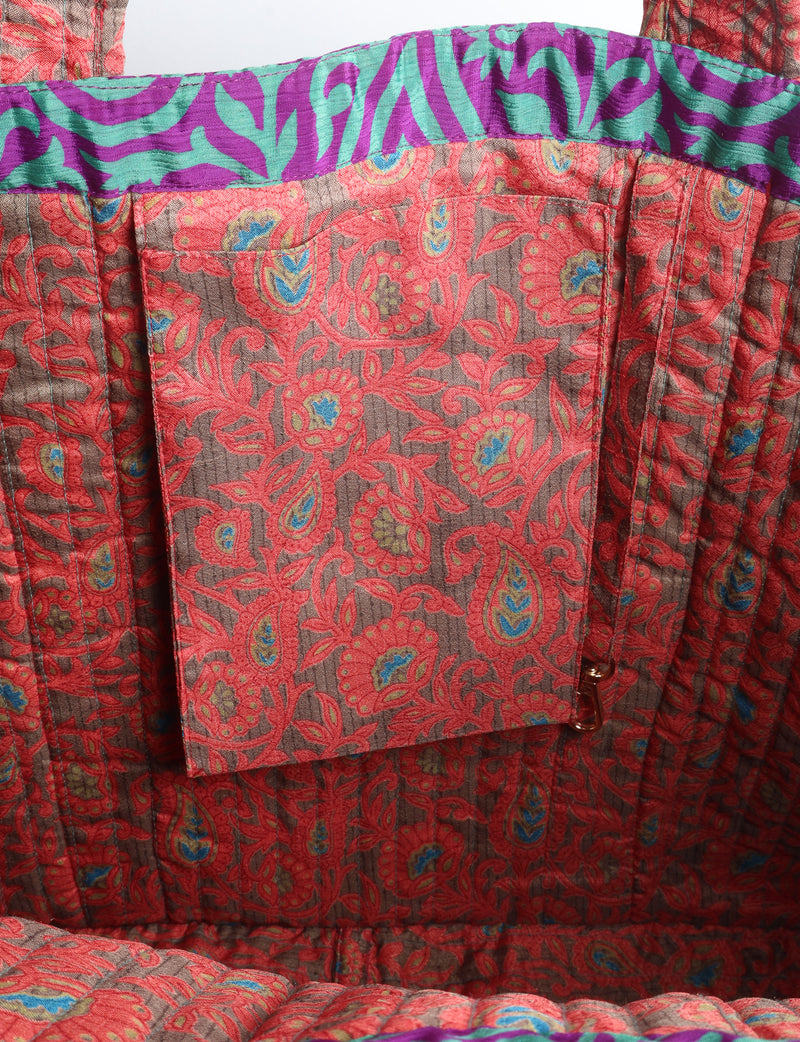 Quilted work tote bag with structured rectangular design and long shoulder straps, representing slow fashion and ethical clothing ideals, made as part of upcycled women's clothing and sustainable women's clothing using recycled fashion and earth friendly clothing practices.