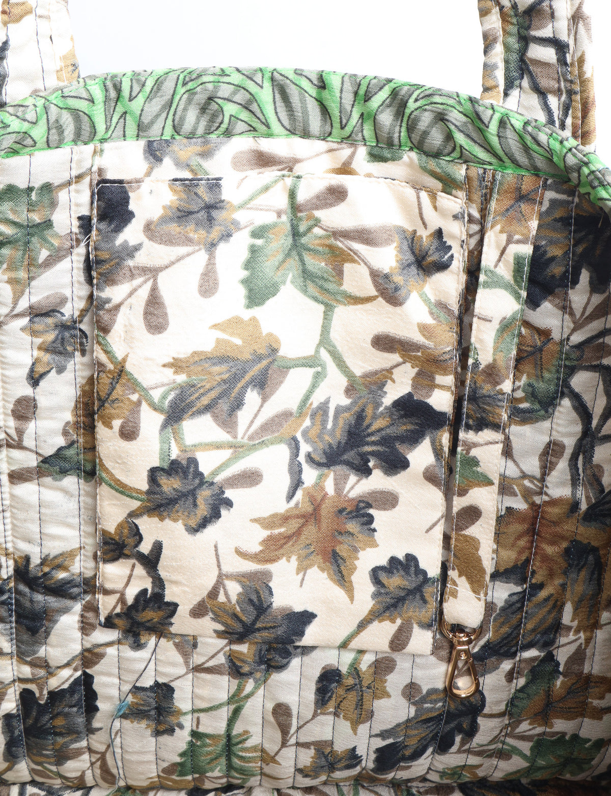 Quilted work tote bag with structured rectangular design and long shoulder straps, representing slow fashion and ethical clothing ideals, made as part of upcycled women's clothing and sustainable women's clothing using recycled fashion and earth friendly clothing practices.