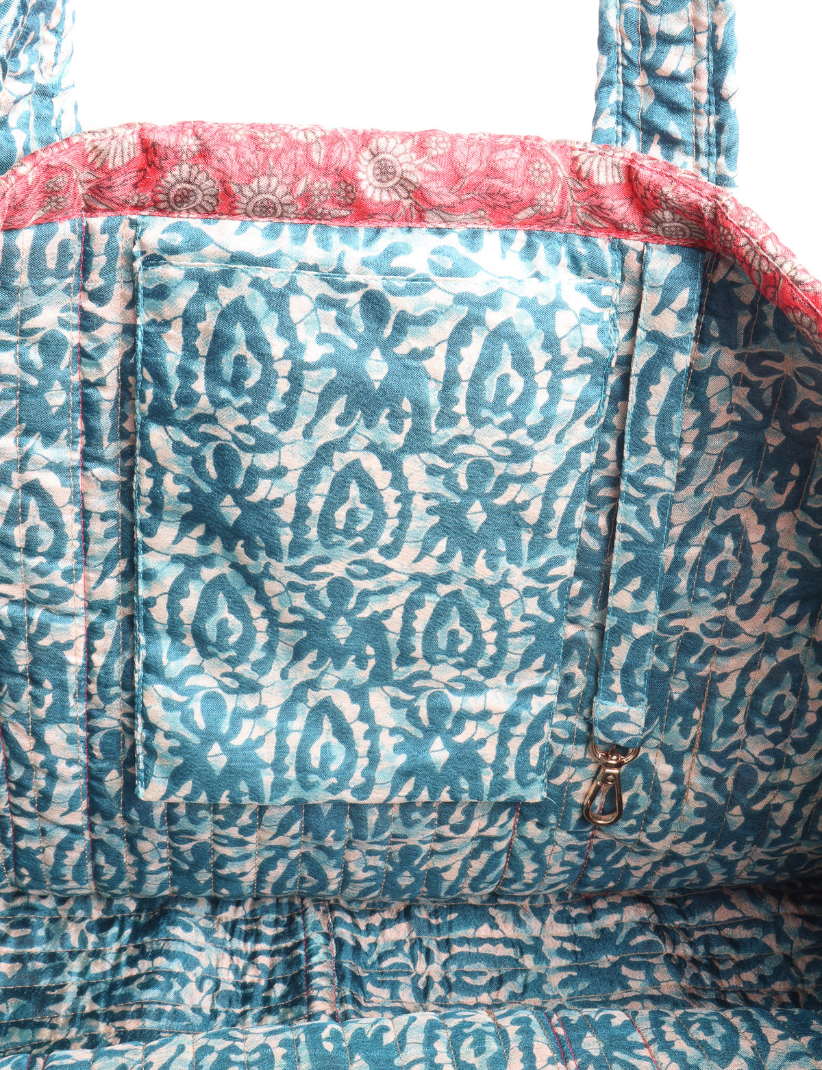 Quilted work tote bag with structured rectangular design and long shoulder straps, representing slow fashion and ethical clothing ideals, made as part of upcycled women's clothing and sustainable women's clothing using recycled fashion and earth friendly clothing practices.