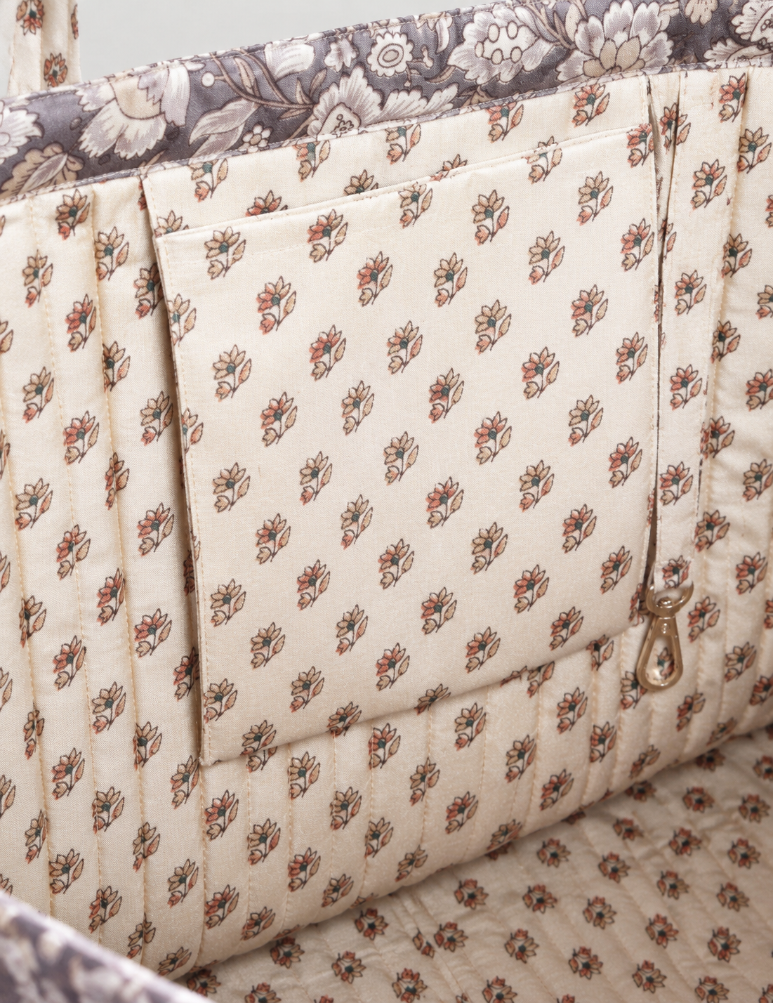 Quilted work tote bag with structured rectangular design and long shoulder straps, representing slow fashion and ethical clothing ideals, made as part of upcycled women's clothing and sustainable women's clothing using recycled fashion and earth friendly clothing practices.