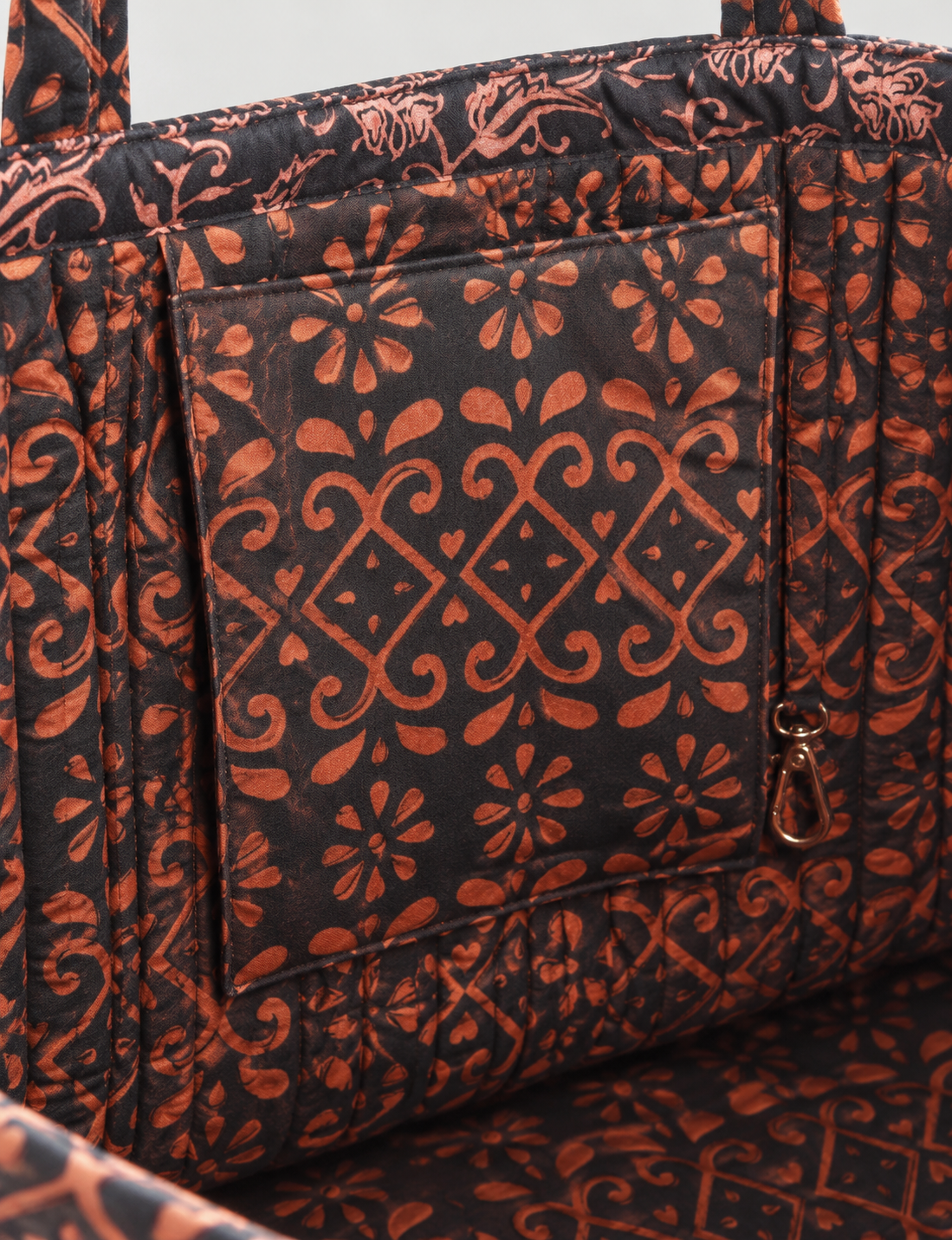 Quilted work tote bag with structured rectangular design and long shoulder straps, representing slow fashion and ethical clothing ideals, made as part of upcycled women's clothing and sustainable women's clothing using recycled fashion and earth friendly clothing practices.