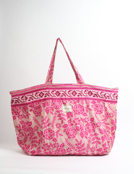 Large beach bag with a spacious rectangular design, wide top opening, and comfortable shoulder handles for carrying daily and travel essentials.