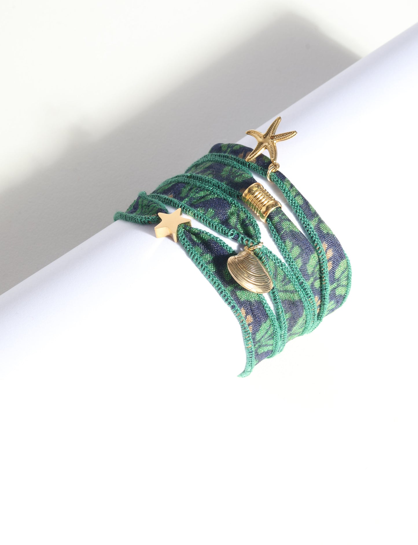 Wrap around bracelet with stainless steel 18K gold-plated charms, adjustable layered bracelet for everyday wear.