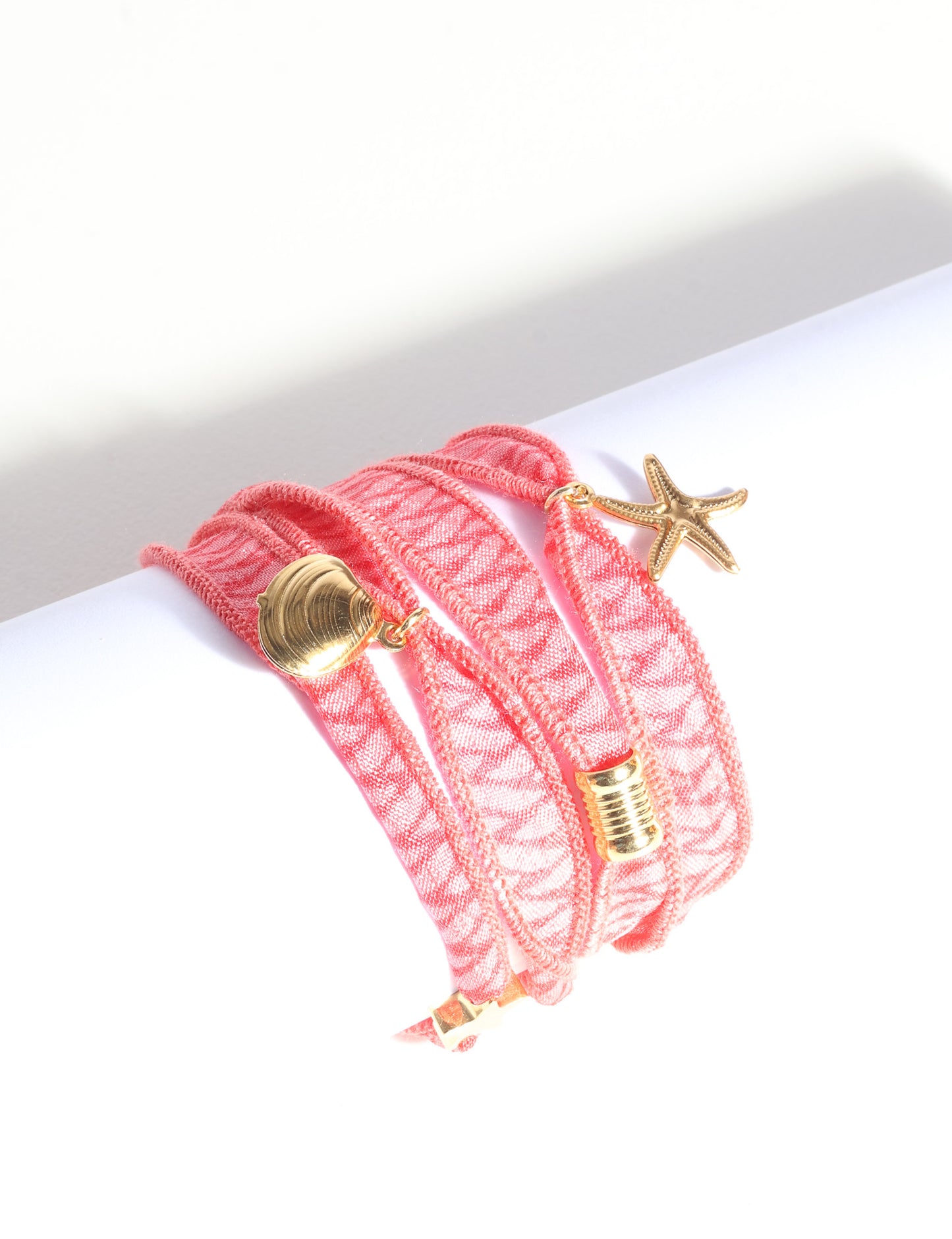 Wrap around bracelet with stainless steel 18K gold-plated charms, adjustable layered bracelet for everyday wear.