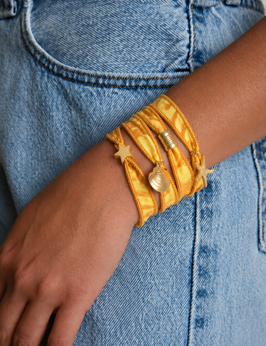 Wrap around bracelet with stainless steel 18K gold-plated charms, adjustable layered bracelet for everyday wear.