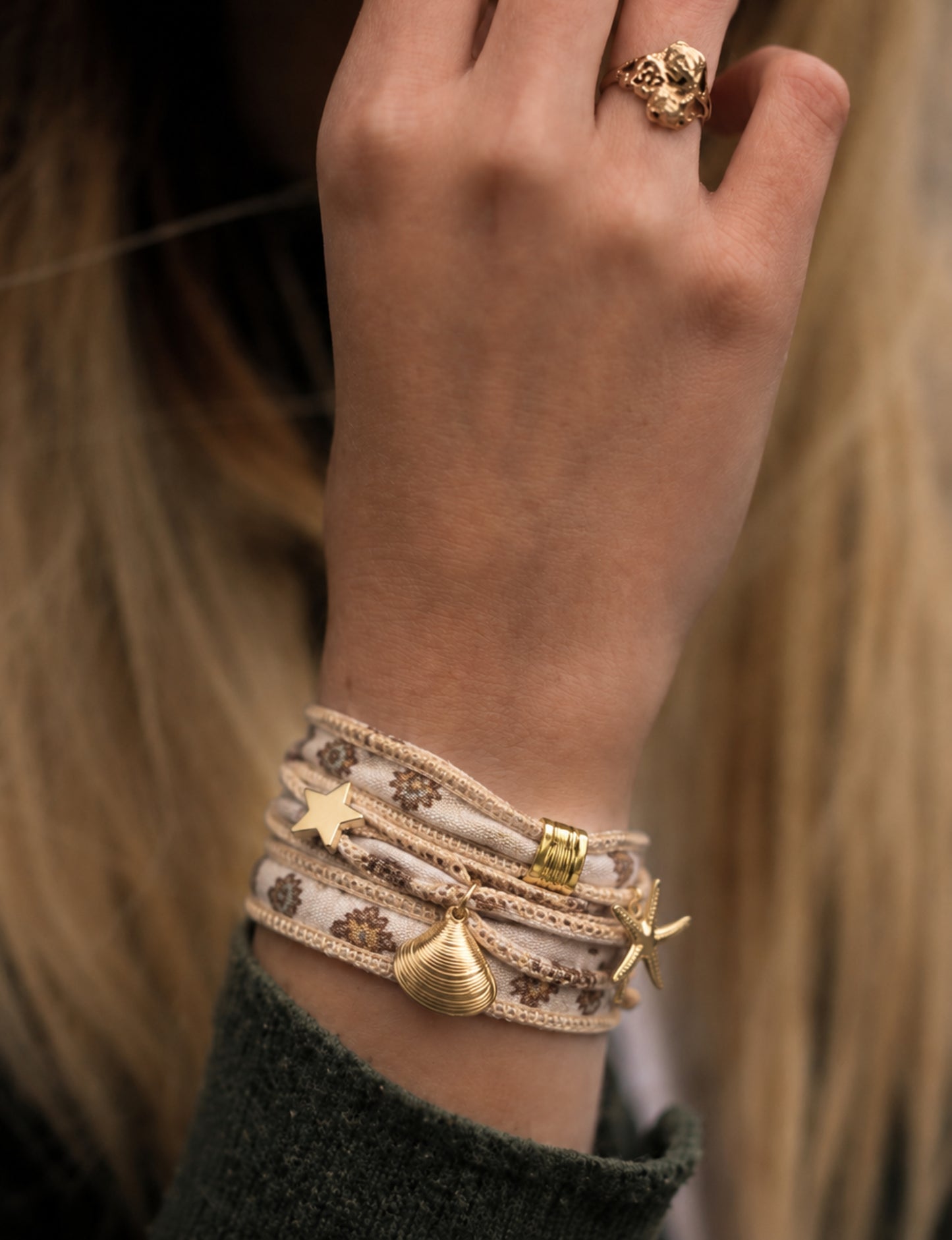 Wrap around bracelet with stainless steel 18K gold-plated charms, adjustable layered bracelet for everyday wear.