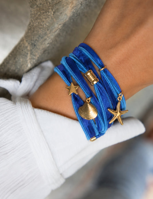 Wrap around bracelet with stainless steel 18K gold-plated charms, adjustable layered bracelet for everyday wear.