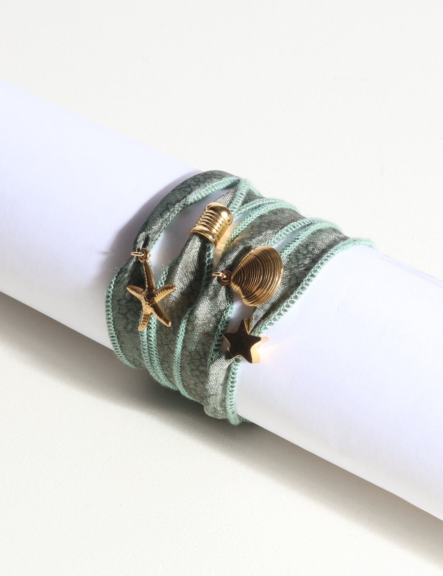 Wrap around bracelet with stainless steel 18K gold-plated charms, adjustable layered bracelet for everyday wear.