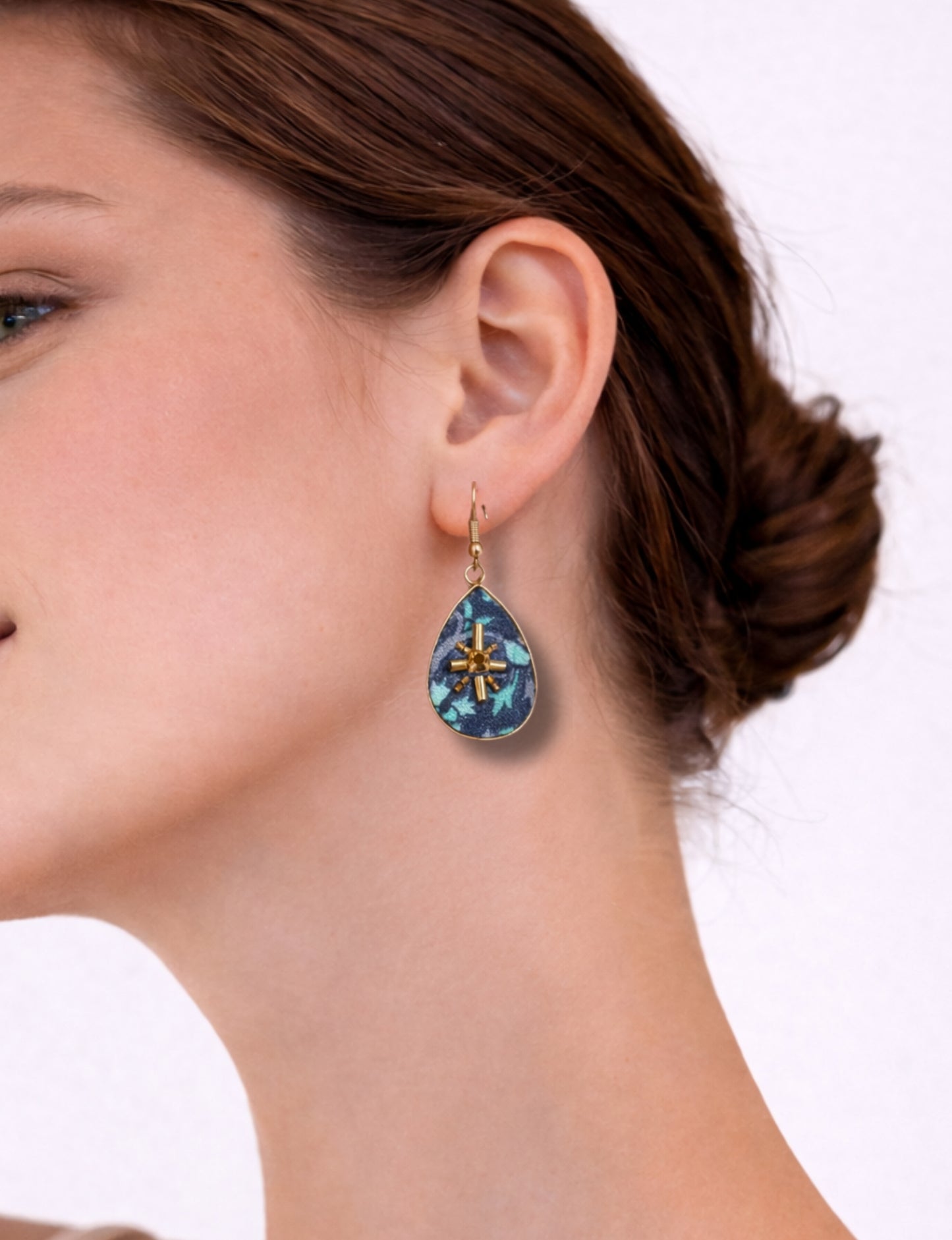 Teardrop embroidery drop earrings inspired by upcycled women’s clothing, sustainable women’s clothing, eco friendly clothes, recycled sustainable fashion, carbon neutral fashion, and environment friendly clothing principles.