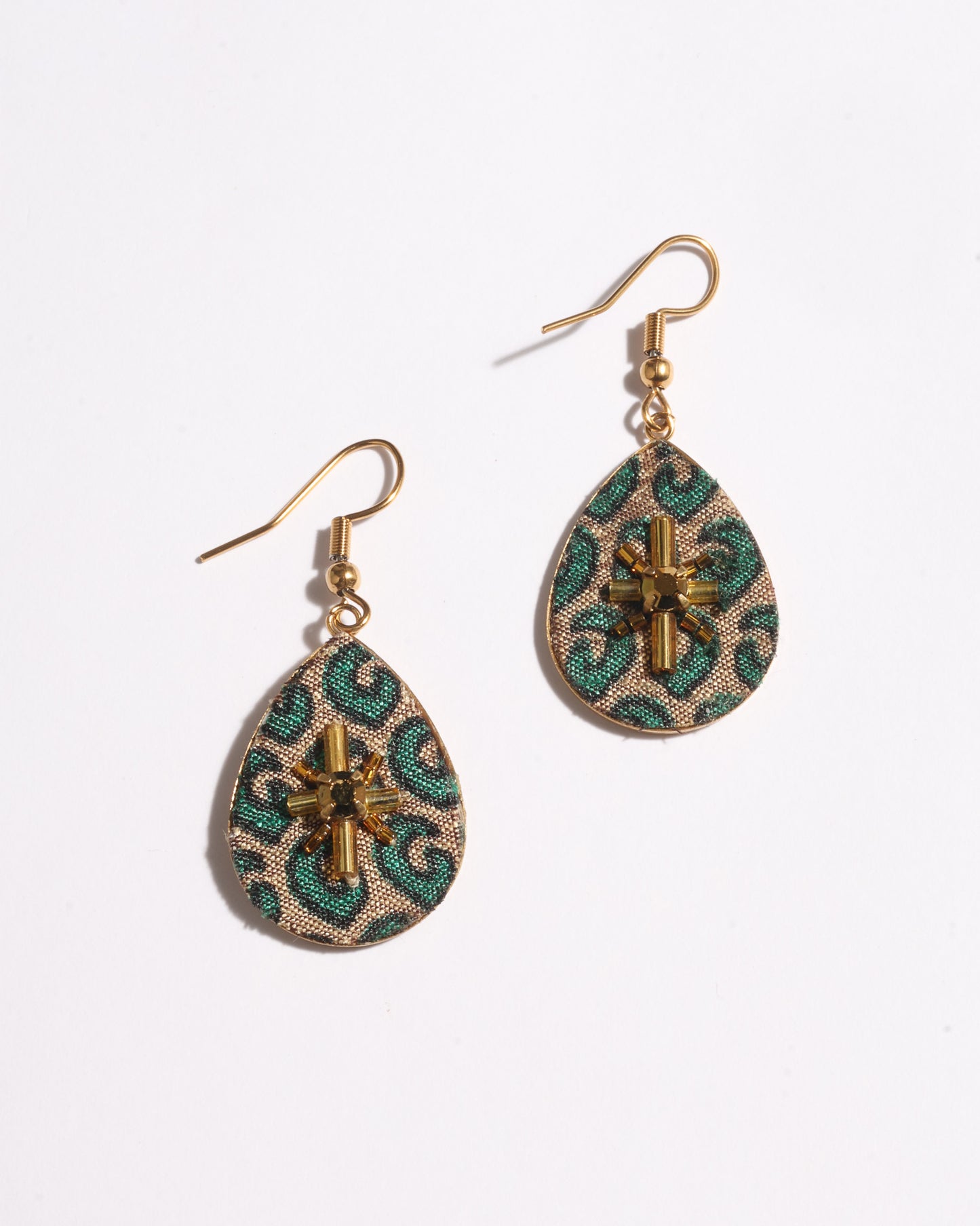 Teardrop embroidery drop earrings inspired by upcycled women’s clothing, sustainable women’s clothing, eco friendly clothes, recycled sustainable fashion, carbon neutral fashion, and environment friendly clothing principles.