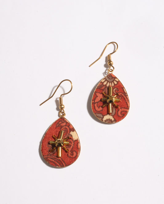 Teardrop embroidery drop earrings inspired by upcycled women’s clothing, sustainable women’s clothing, eco friendly clothes, recycled sustainable fashion, carbon neutral fashion, and environment friendly clothing principles.
