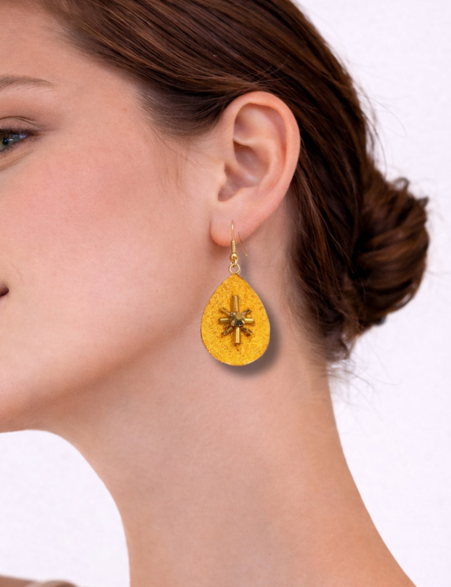 Teardrop embroidery drop earrings inspired by upcycled women’s clothing, sustainable women’s clothing, eco friendly clothes, recycled sustainable fashion, carbon neutral fashion, and environment friendly clothing principles.