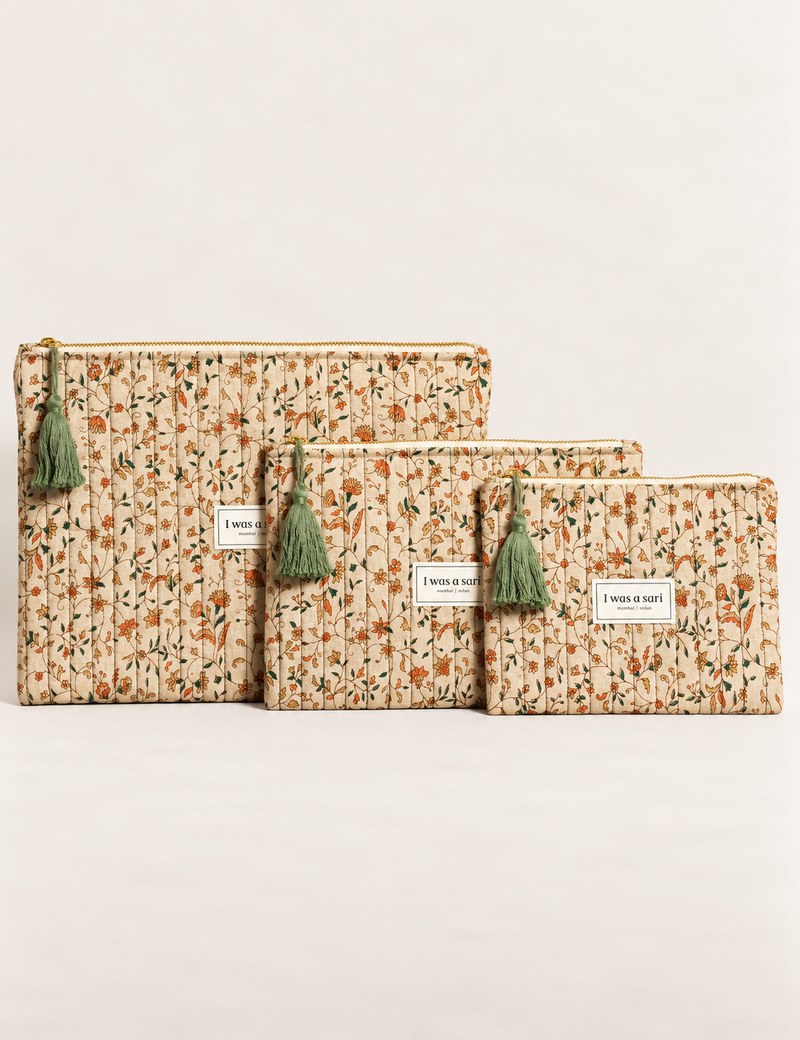 Quilted zipper pouch with tassel trim, available in three sizes for organising everyday essentials.