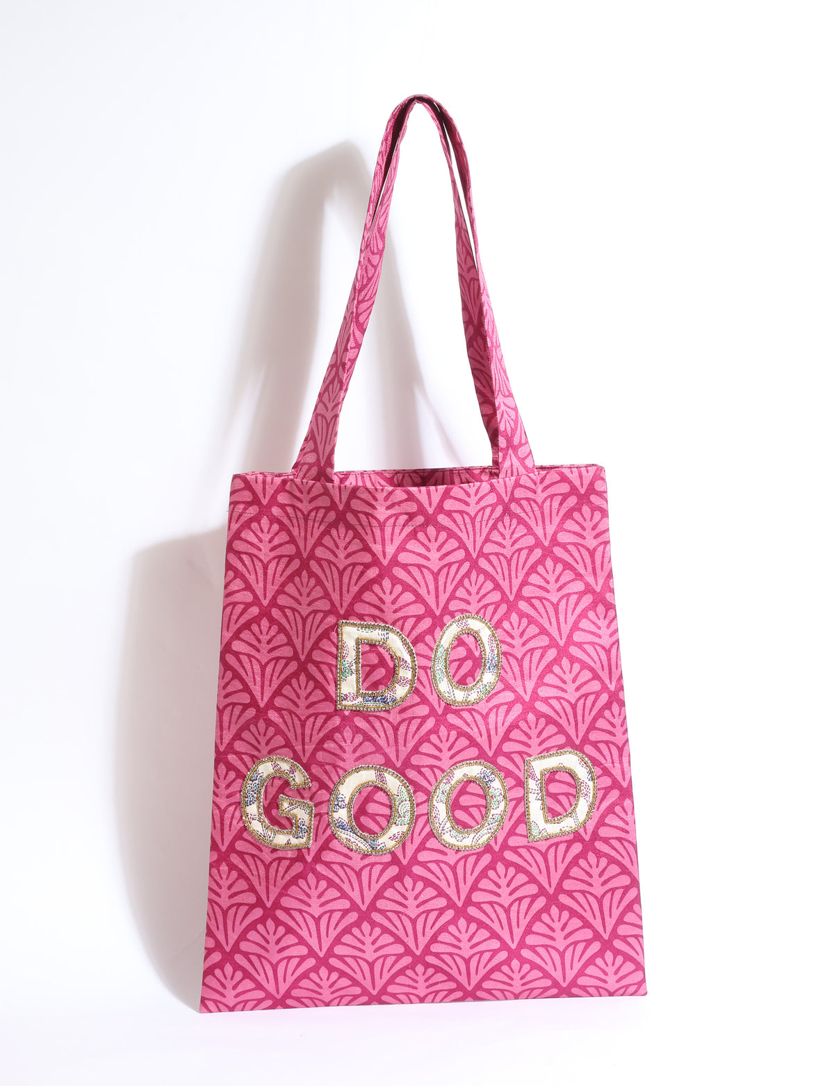 DO GOOD tote bag featuring contrasting sari fabric appliqué lettering, double shoulder straps, soft construction and an internal slip pocket with piping detail.