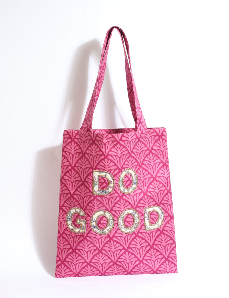 DO GOOD tote bag featuring contrasting sari fabric appliqué lettering, double shoulder straps, soft construction and an internal slip pocket with piping detail.