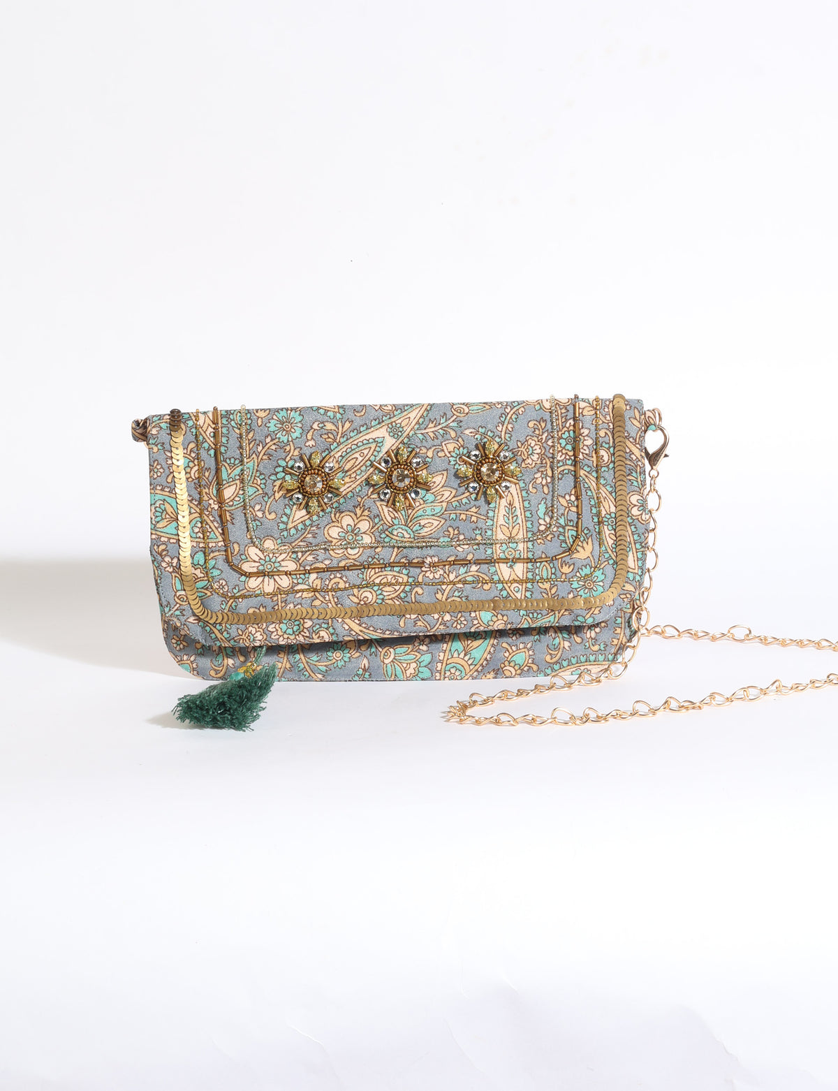 Embroidered evening bag with embellished fold-over flap, tassel detail, and detachable metal chain strap.