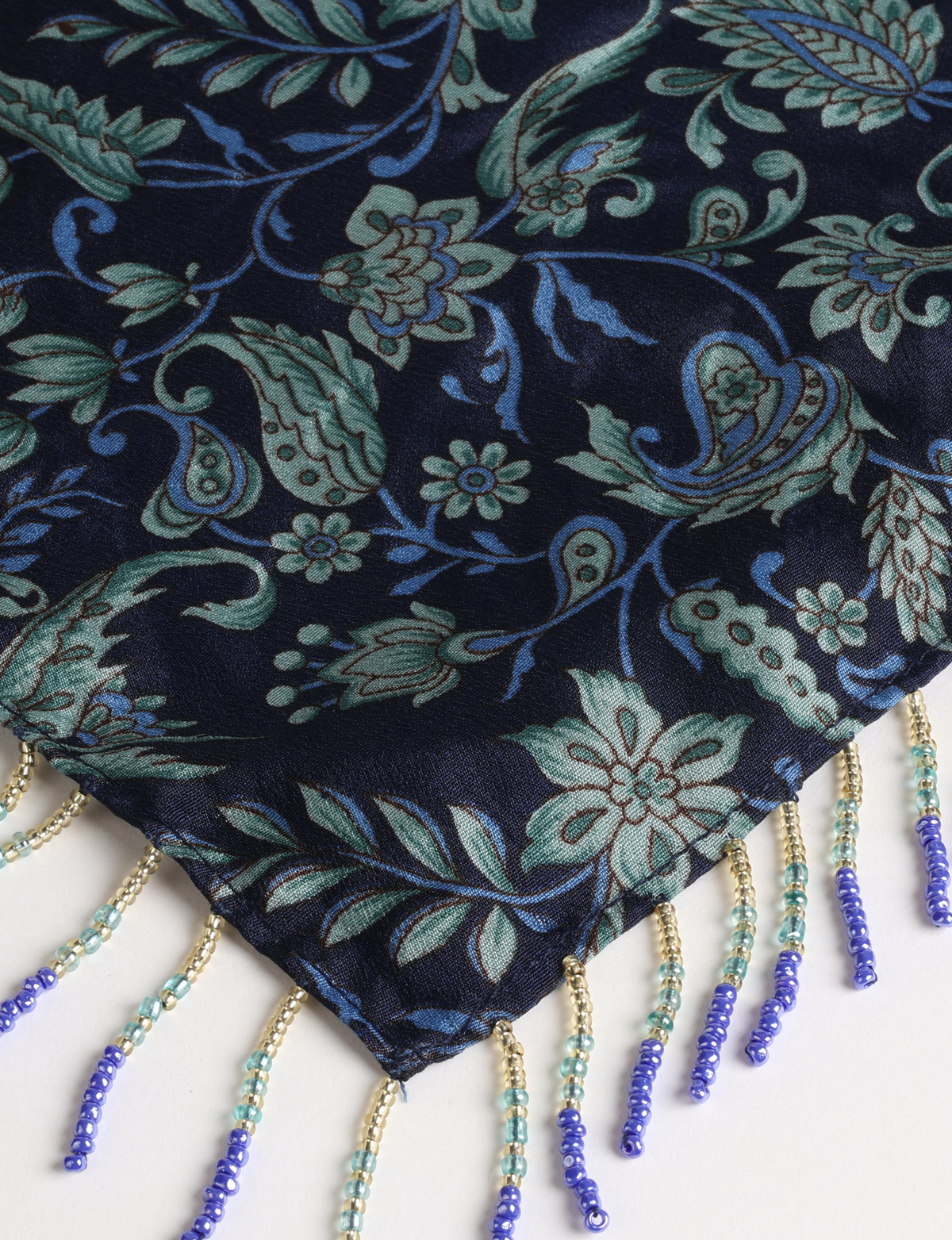 Square lightweight neck scarf with delicate beaded fringes along the edges and neatly stitched finishing, designed for versatile styling.