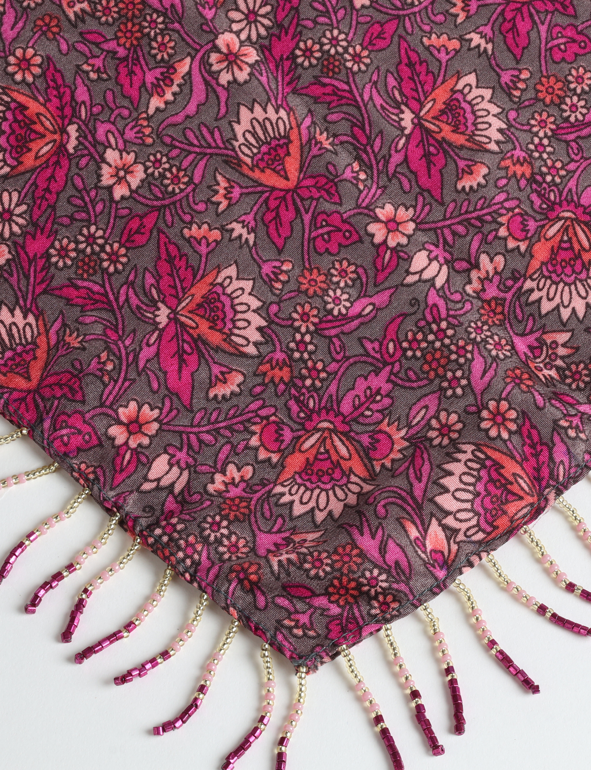 Square lightweight neck scarf with delicate beaded fringes along the edges and neatly stitched finishing, designed for versatile styling.