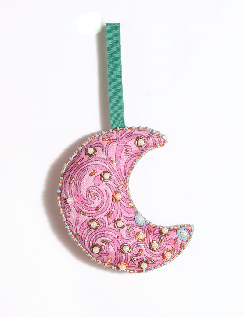 Cheer crescent moon festive ornament made from colorful upcycled sari fabric with Aari embroidery, donated beads and stones.