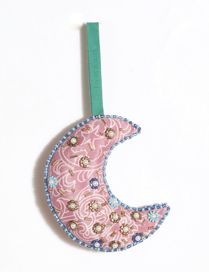 Cheer crescent moon festive ornament made from colorful upcycled sari fabric with Aari embroidery, donated beads and stones.