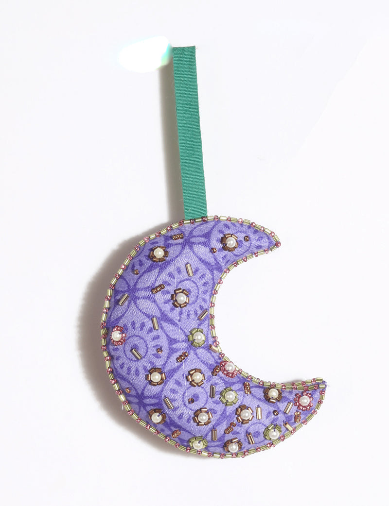 Cheer crescent moon festive ornament made from colorful upcycled sari fabric with Aari embroidery, donated beads and stones.