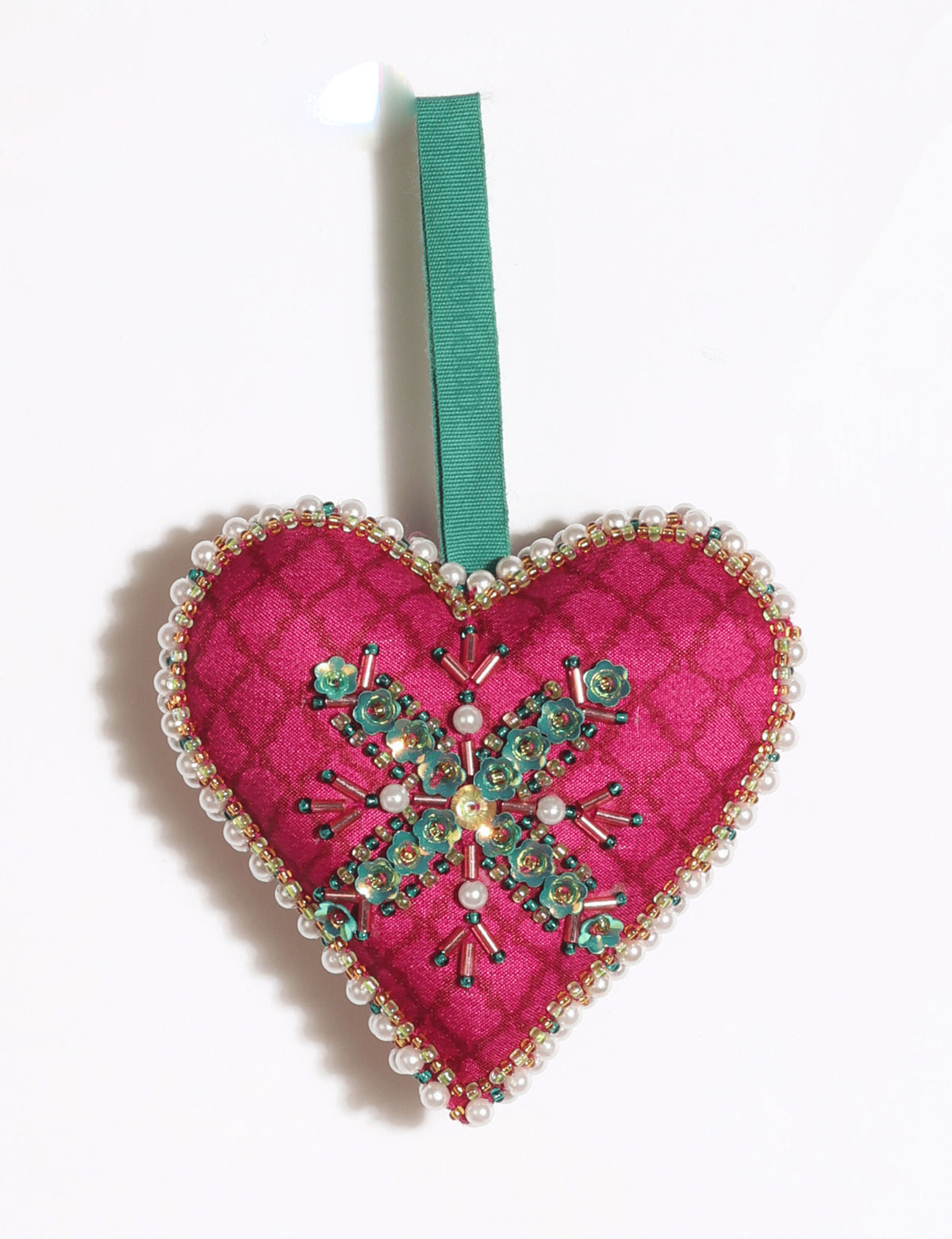Cheer heart-shaped festive ornament made from vibrant upcycled saris with hand-embroidered Aari work, beads, sequins, and pearls.