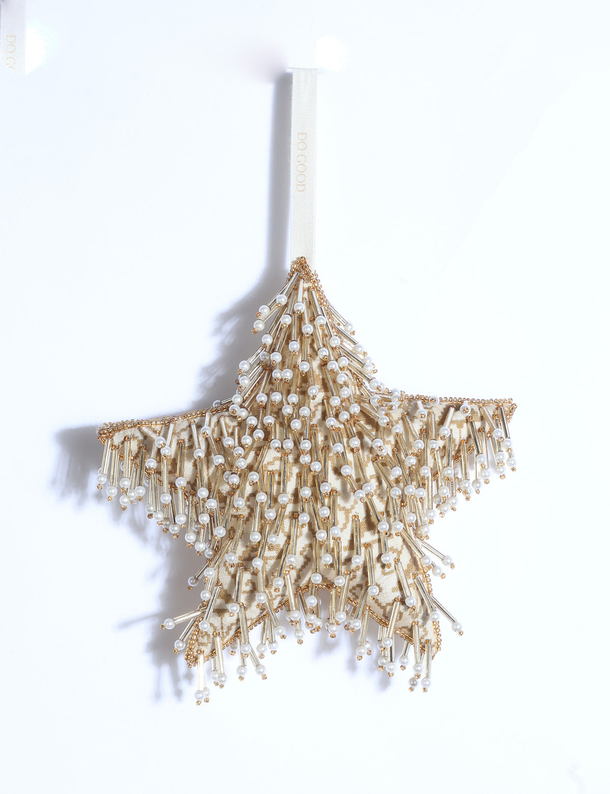 Gold embroidered star ornament made from upcycled preloved saris with stones, sequins, pearls and glass beads.