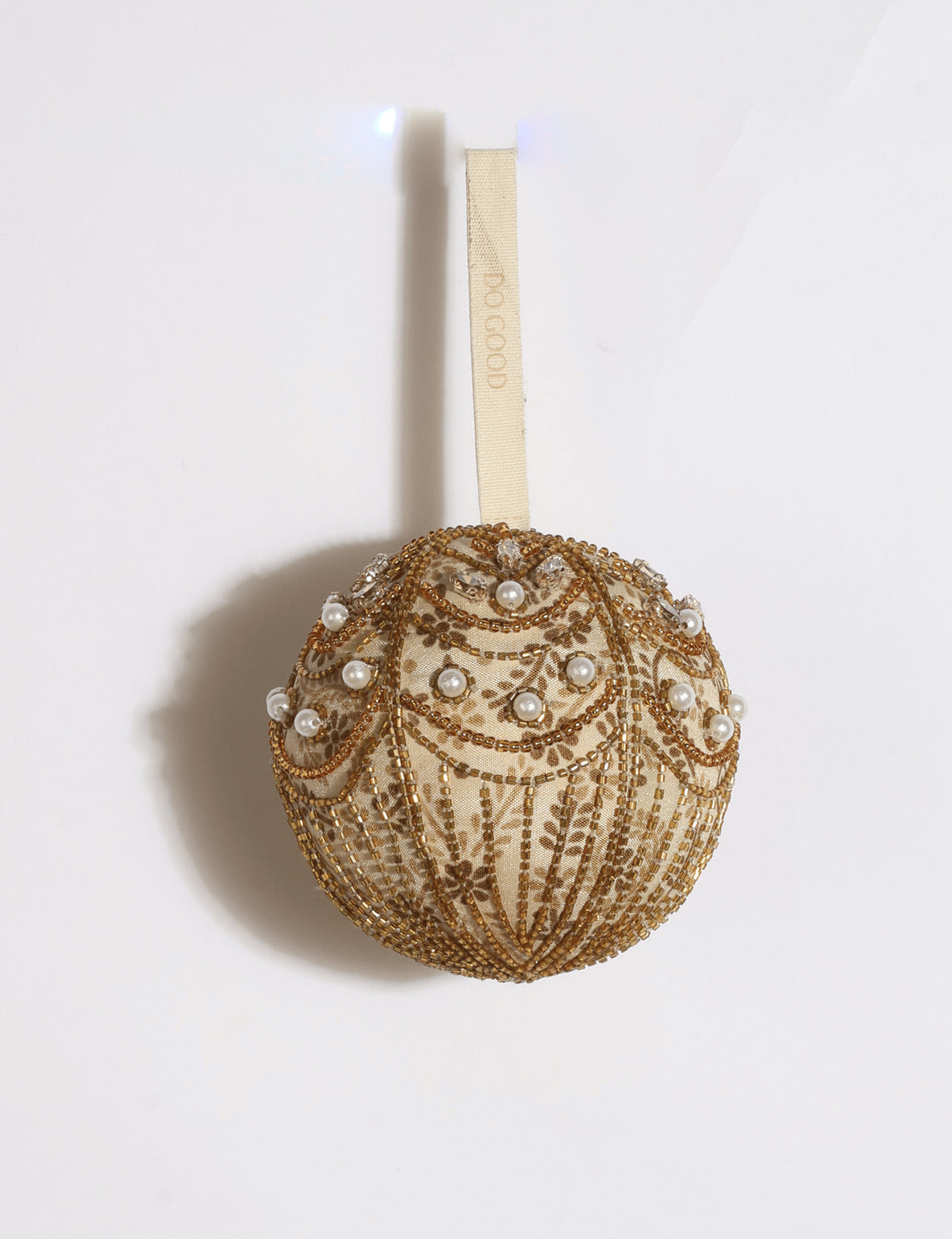 Gold and ivory upcycled sari ball ornament with silver embroidery, pearls, sequins, and beads
