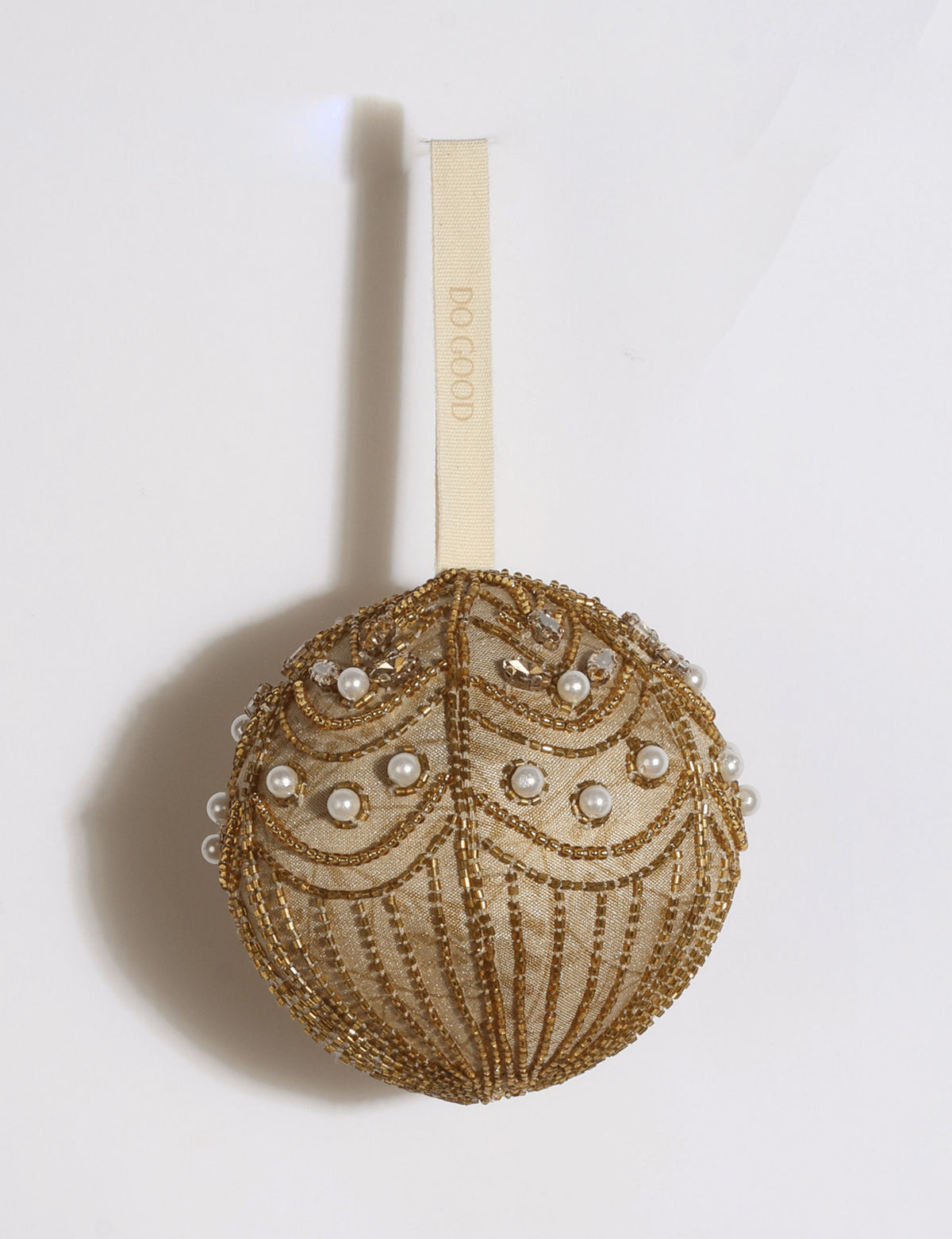 Gold and ivory upcycled sari ball ornament with silver embroidery, pearls, sequins, and beads