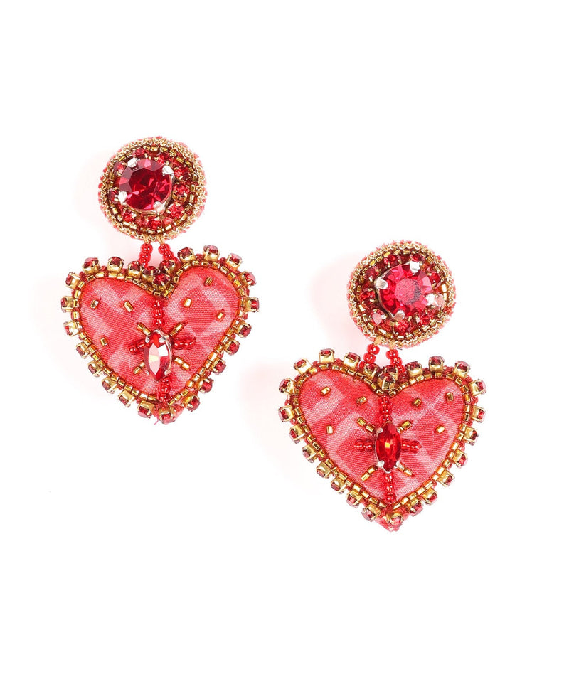 Pink heart drop earrings with red and gold bead embellishments and central red gemstones, shown flat on white background