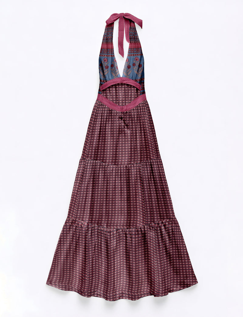 Sleeveless maxi dress with pink leaf pattern, halter neck tie, deep V neckline, and tiered skirt, flat lay view