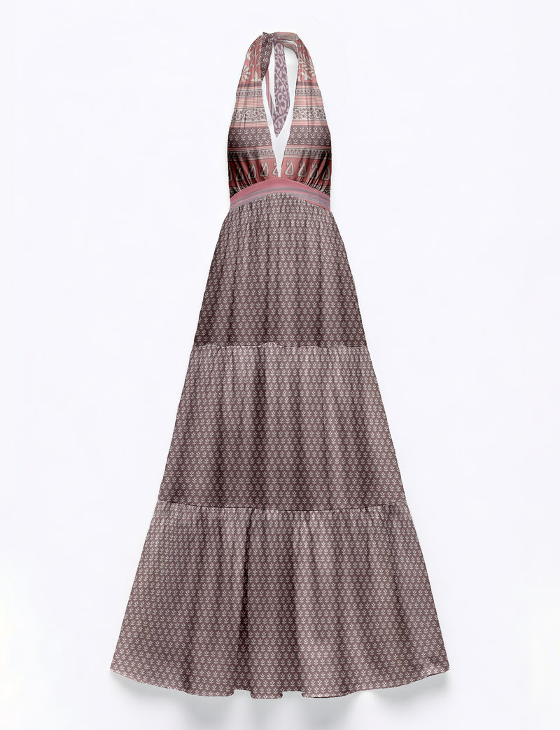 Purple maxi dress with tiered skirt, halter neckline, and mixed micro floral and paisley patterns, flat lay view