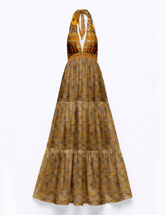 Maxi tiered dress by I was a Sari with halter neckline and flowy silhouette