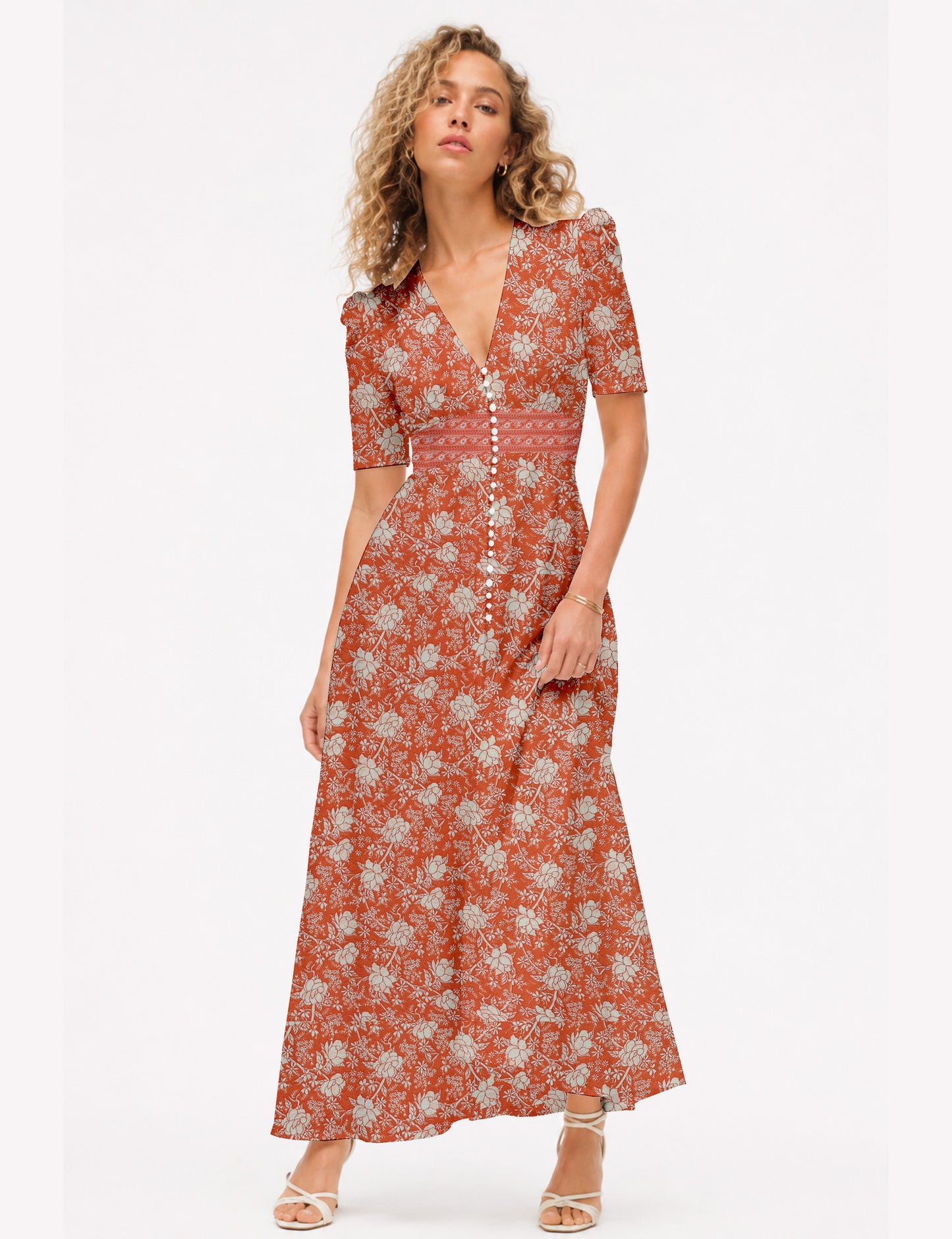 Maxi romantic dress with a fitted bodice, V-neckline, functional button placket, structured waist panel, short sleeves, and a softly flared ankle-length A-line skirt.