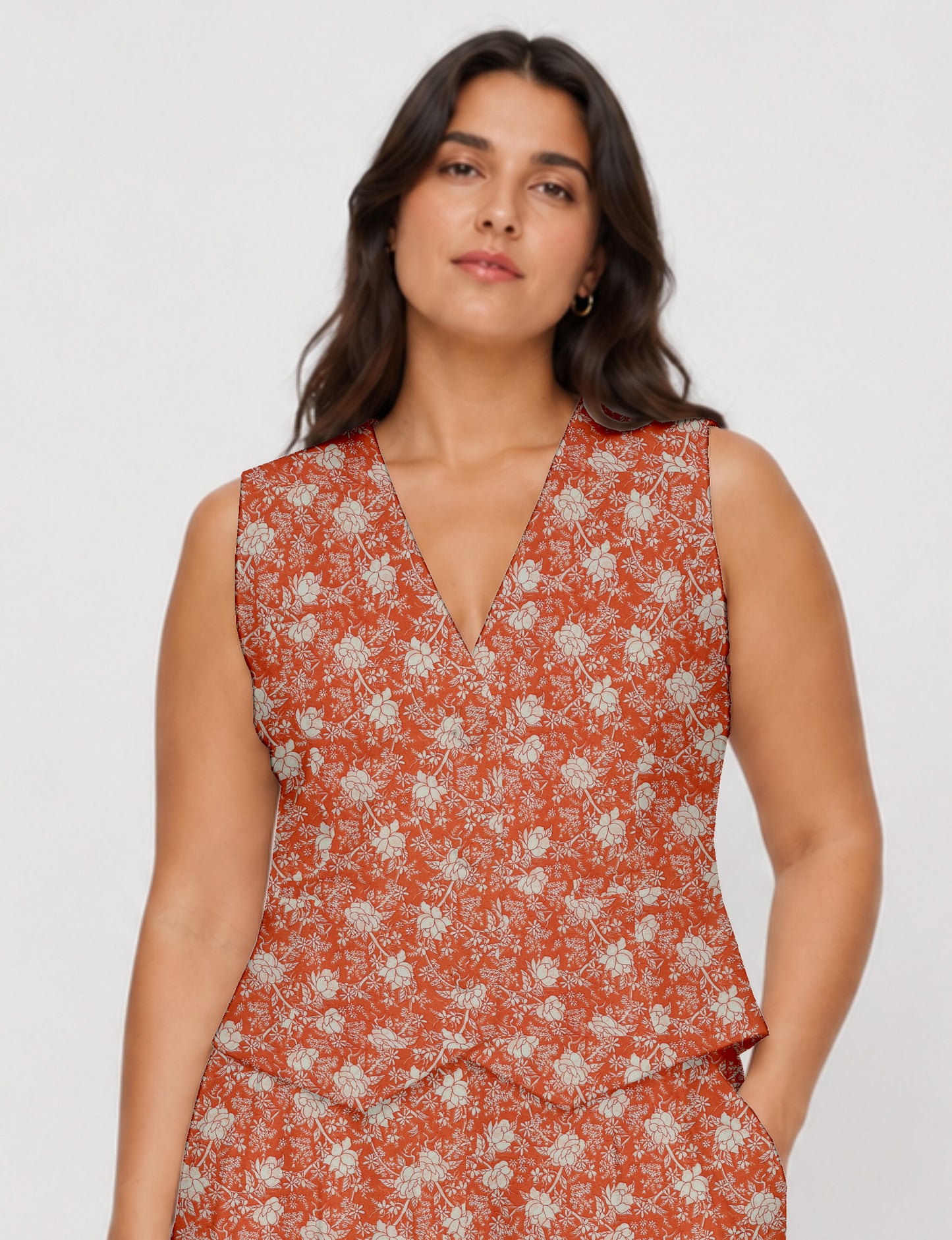 Women's fitted waistcoat with V-neck, single-breasted button closure, tailored silhouette, and pointed hem in sustainable fashion.