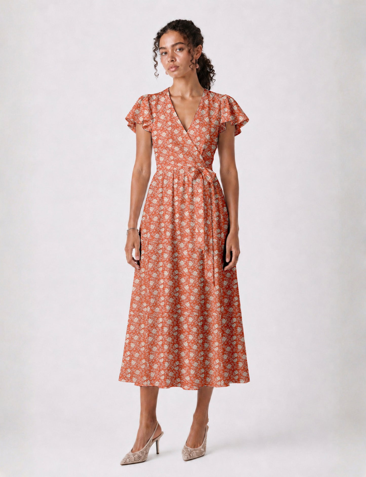 Elegant midi wrap dress with a V-neckline, adjustable waist tie, fitted bodice, and flared skirt for a timeless, flattering silhouette.