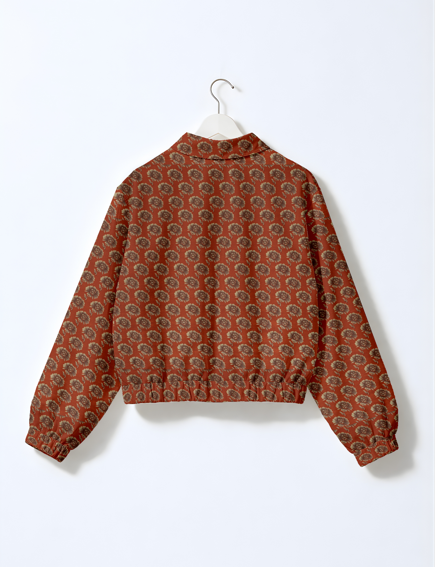 Upcycled Bomber Jacket made from recycled sari materials, featuring a cute cropped shape, elasticated hem and cuffs, and contrast sari print lining. Sustainable apparel promoting eco-friendly fashion and ethical clothing.