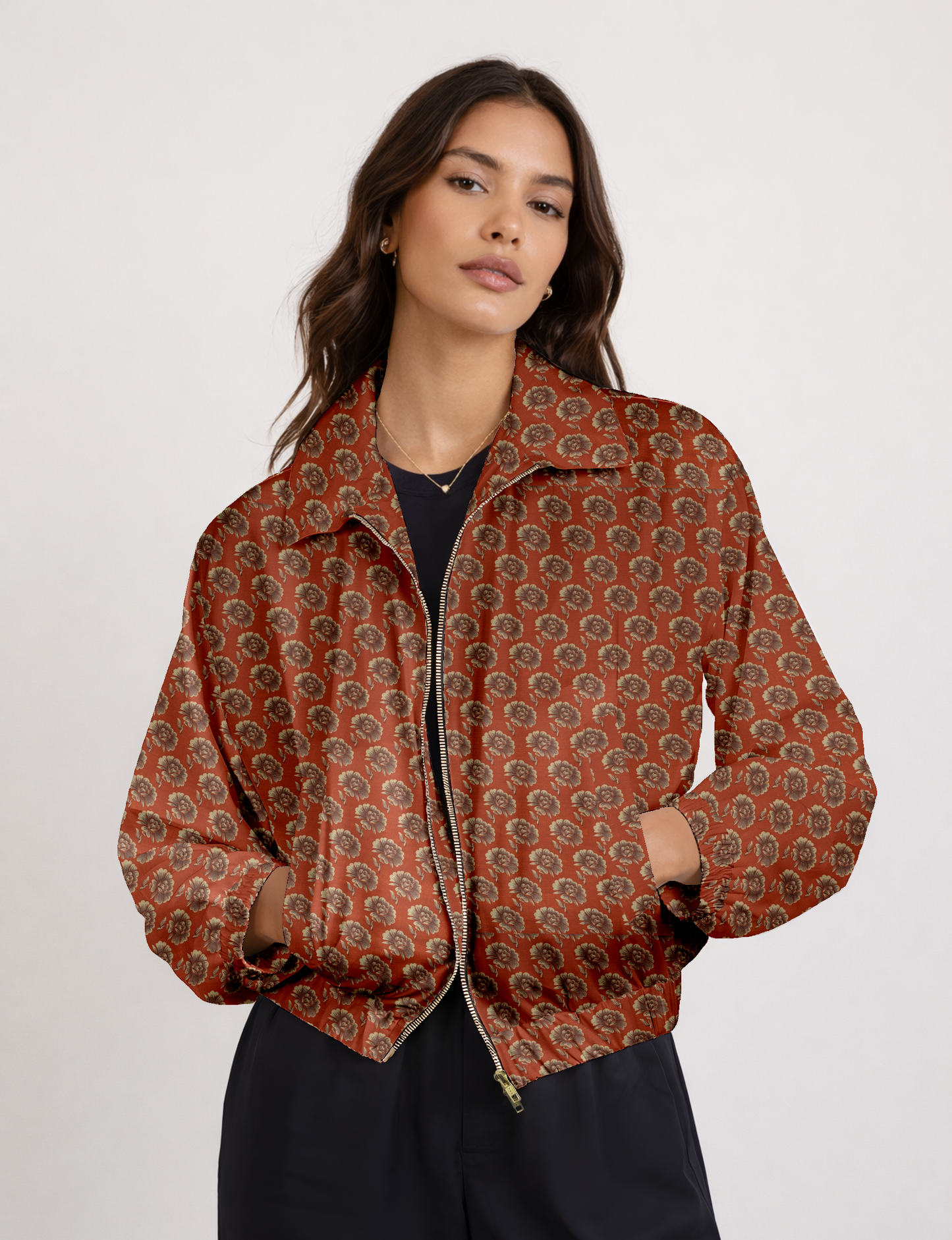Upcycled Bomber Jacket made from recycled sari materials, featuring a cute cropped shape, elasticated hem and cuffs, and contrast sari print lining. Sustainable apparel promoting eco-friendly fashion and ethical clothing.