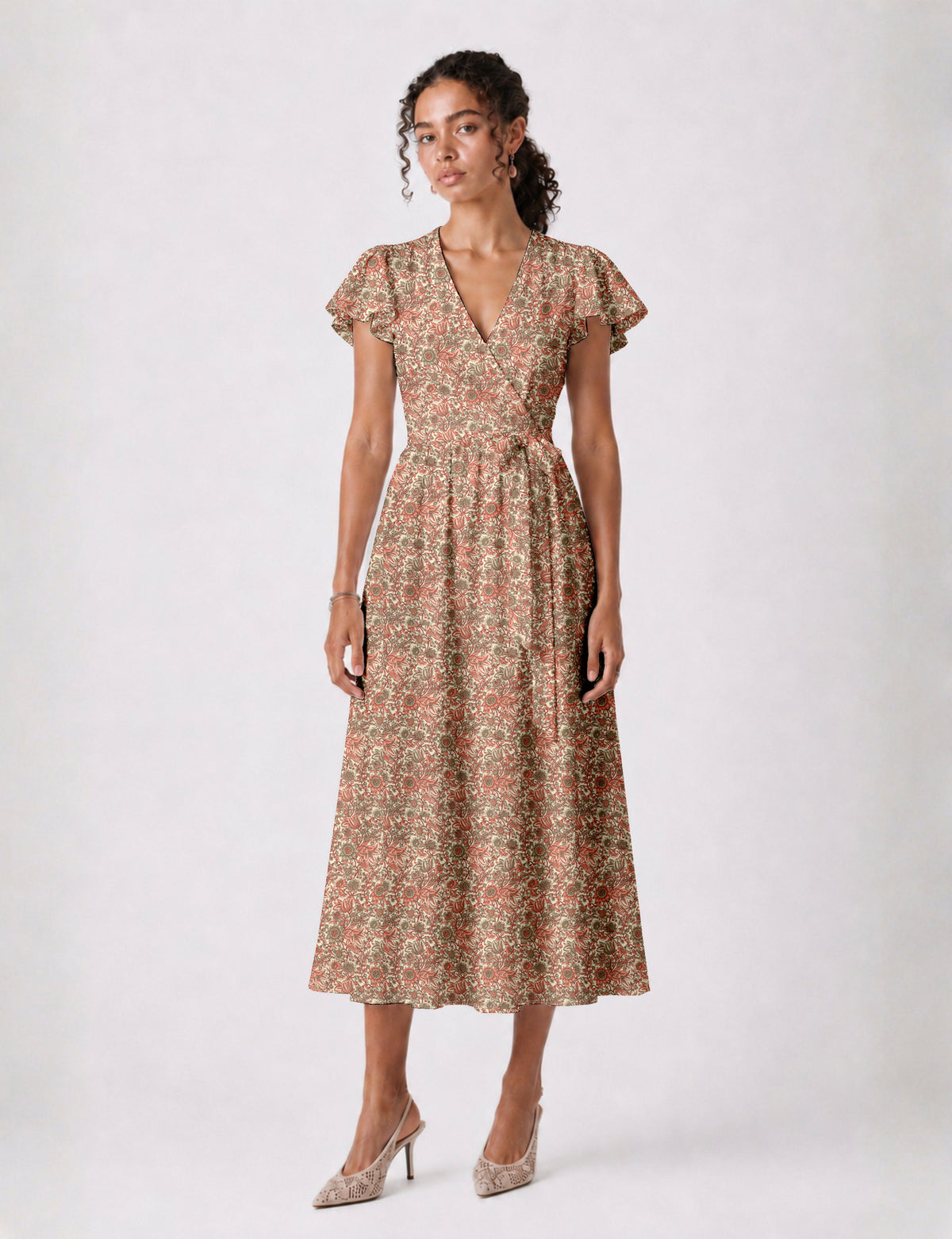Elegant midi wrap dress with a V-neckline, adjustable waist tie, fitted bodice, and flared skirt for a timeless, flattering silhouette.