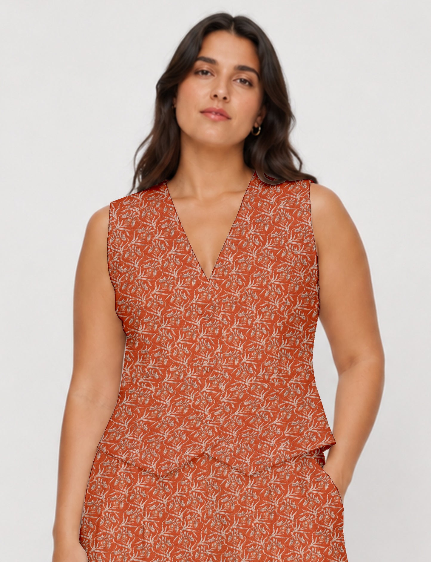Women's fitted waistcoat with V-neck, single-breasted button closure, tailored silhouette, and pointed hem in sustainable fashion.