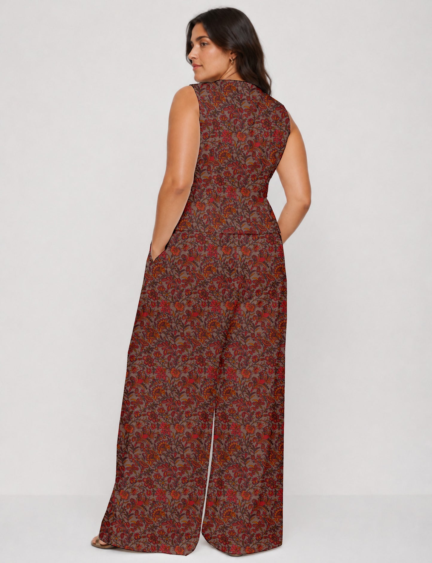 Women's tailored waistcoat set with a sleeveless V-neck button-front waistcoat and high-rise wide leg trousers in a coordinated matching outfit.