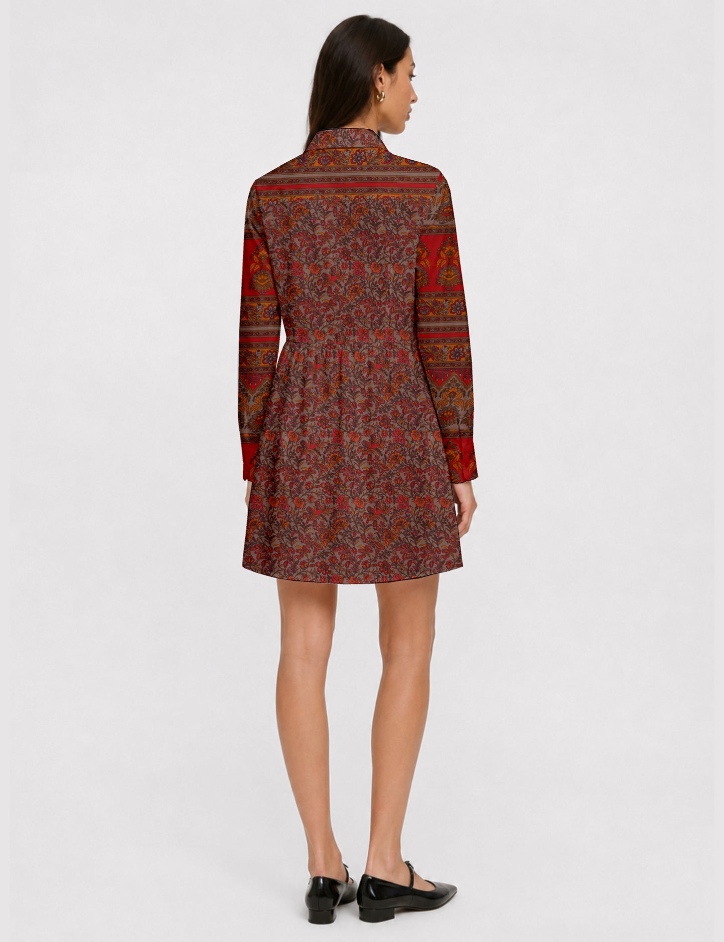 Short shirt dress with a relaxed A-line silhouette, point collar, partial button placket, gathered waist, side pockets, and full-length cuffed sleeves.