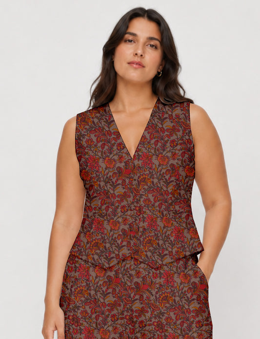 Women's fitted waistcoat with V-neck, single-breasted button closure, tailored silhouette, and pointed hem in sustainable fashion.