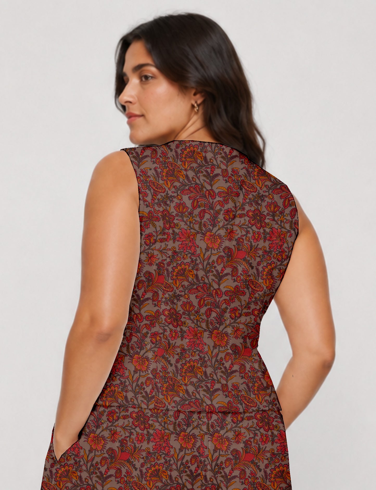 Women's fitted waistcoat with V-neck, single-breasted button closure, tailored silhouette, and pointed hem in sustainable fashion.